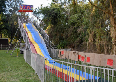 Colorful mega slide for parties, festivals & events—safe, thrilling fun for all ages!