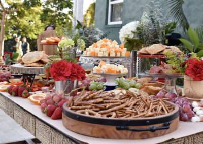 Elegant grazing table with cheese, fruit, and charcuterie—perfect for weddings, garden parties, and celebrations.