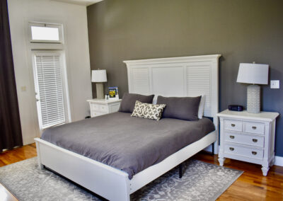Luxury bedroom with king bed and elegant furnishings at Saint Patrick Palace estate