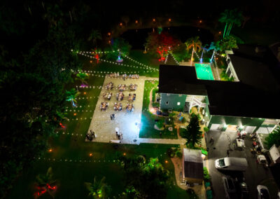 Elegant outdoor wedding reception with glowing string lights at Saint Patrick Palace.