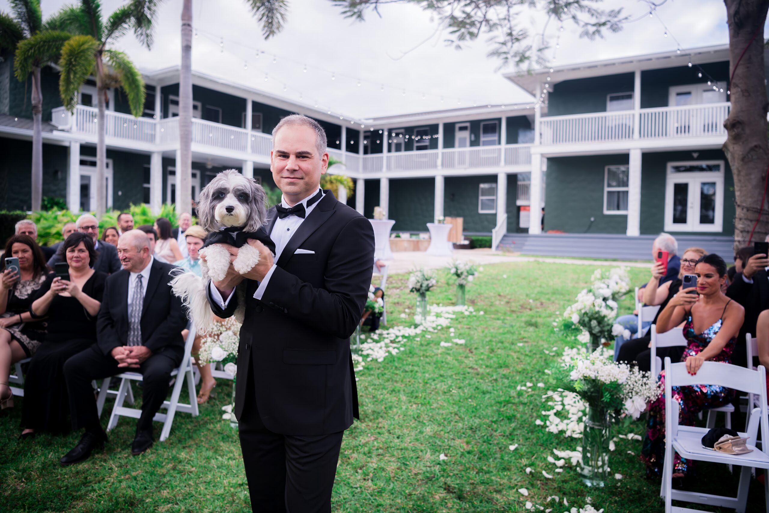 Pet-friendly wedding venue in Davie, FL with tuxedo pup moments at Saint Patrick Palace.