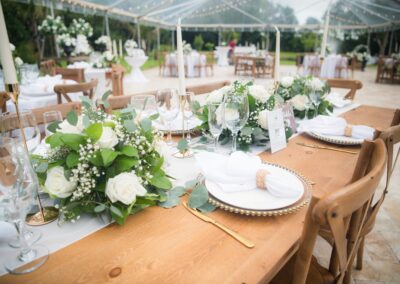 White rose & greenery wedding table décor with gold accents at Saint Patrick Palace.