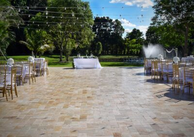 Elegant outdoor wedding reception with bistro lights at Saint Patrick Palace.