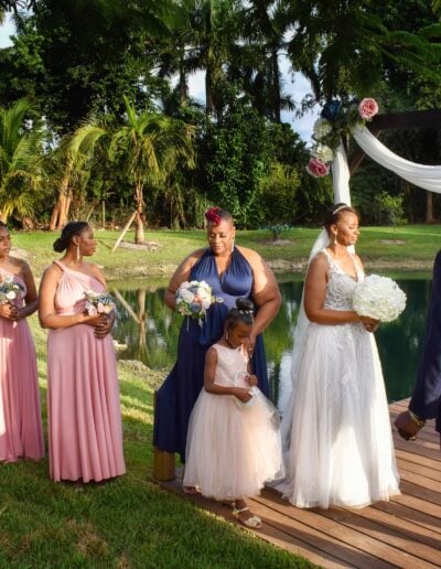 Romantic waterside wedding with lush scenery at Saint Patrick Palace.