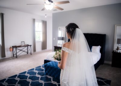 Bride in elegant suite preparing for Airbnb wedding in South Florida
