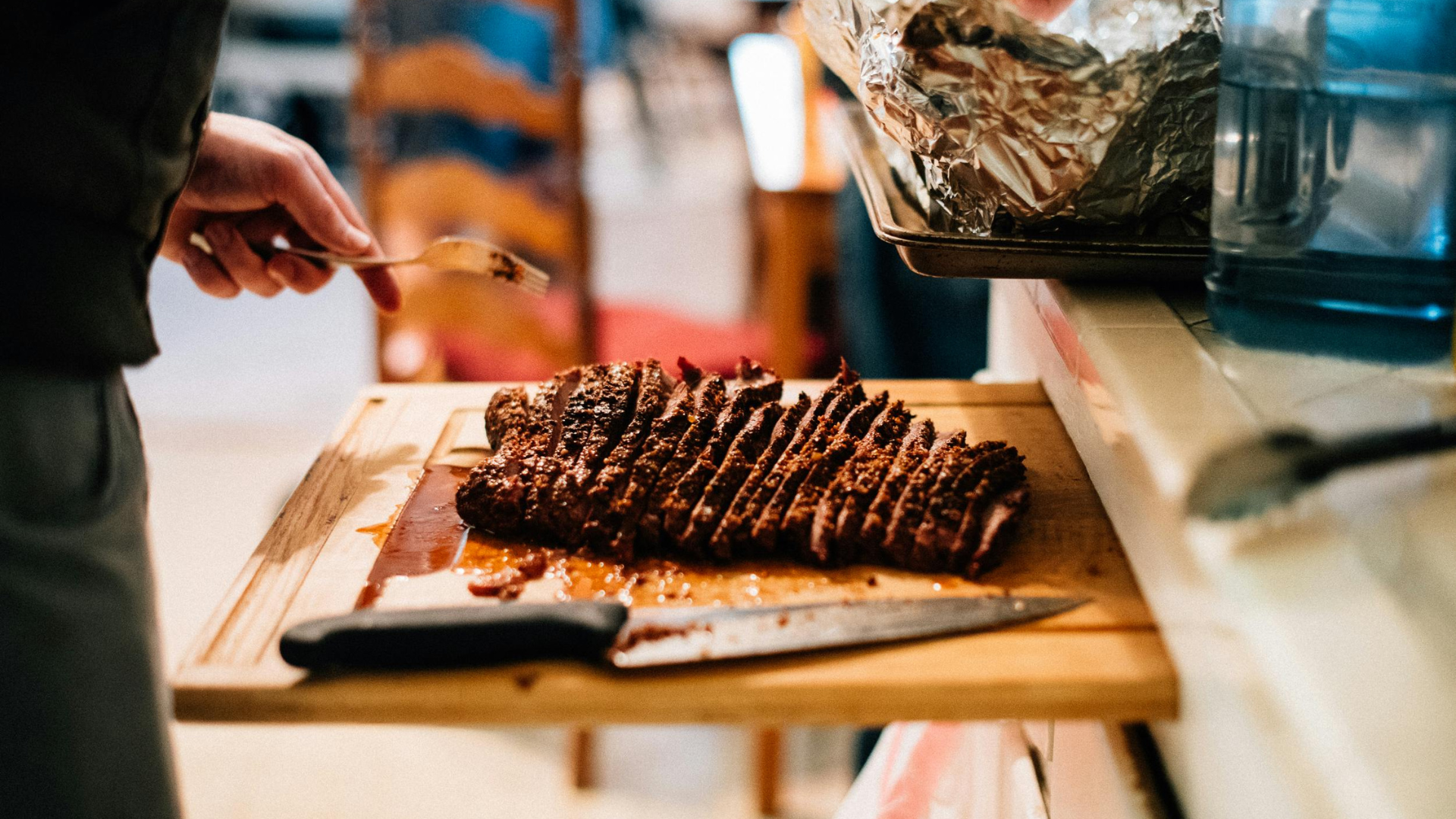 Texas BBQ brisket sliced at a wedding catering station in South Florida with open vendor options.