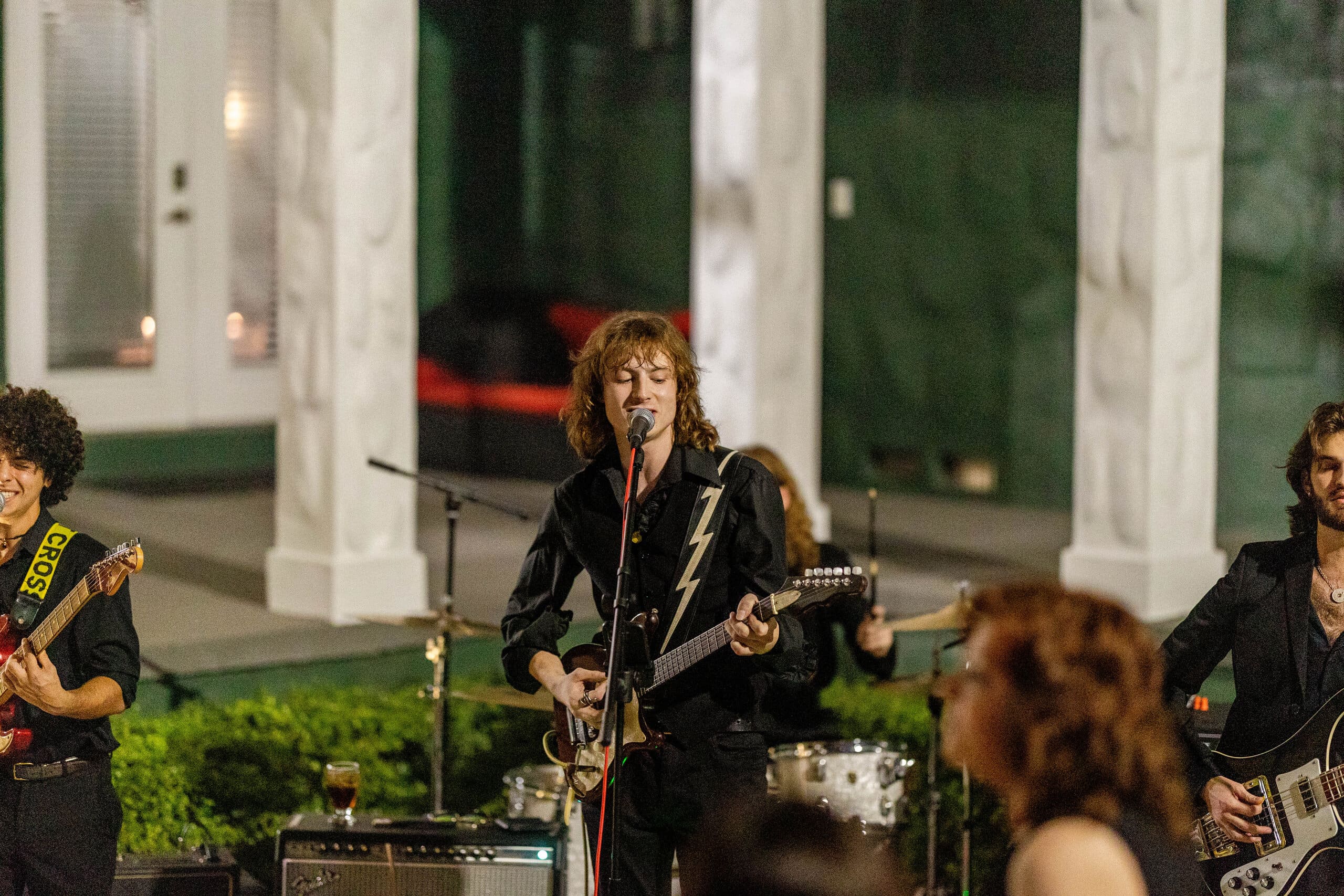 Live band performing during a black-tie 50th birthday celebration at a luxury mansion in South Florida.