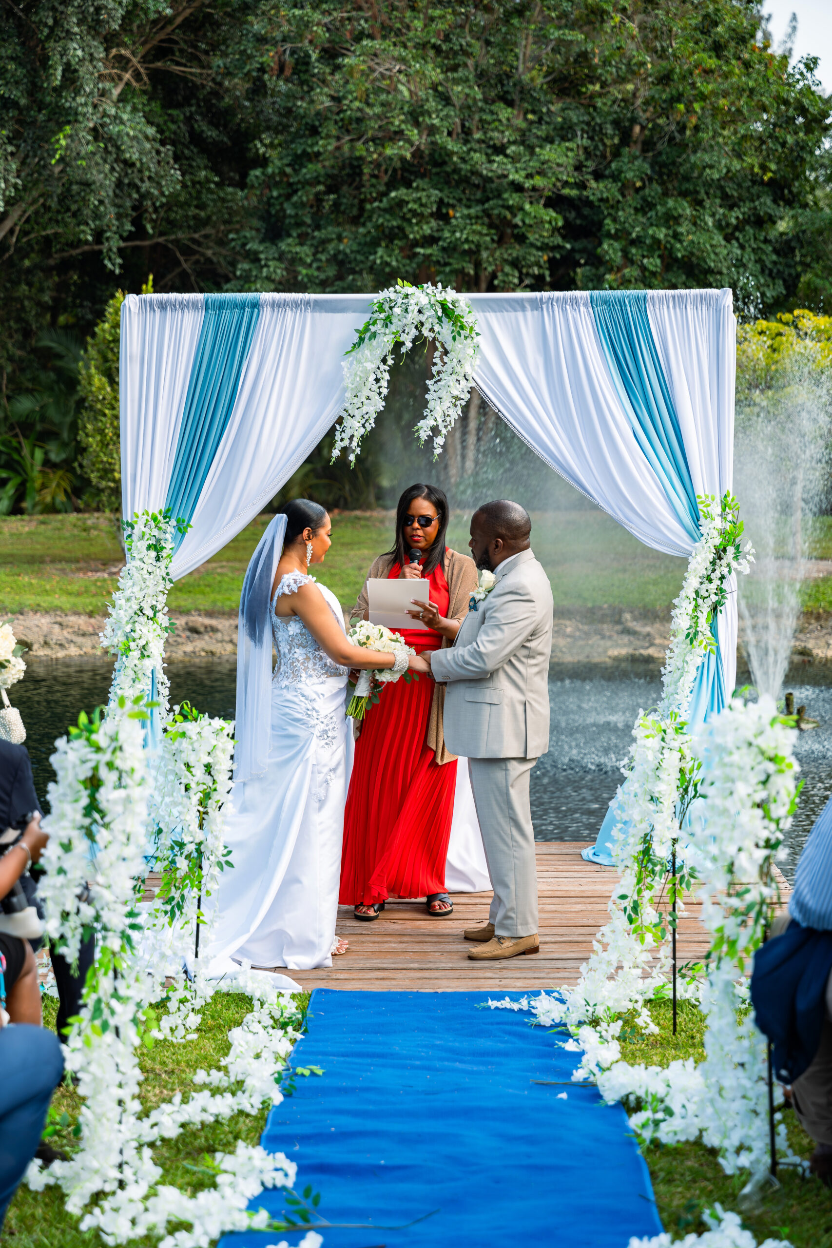 Beautiful waterfront wedding vows at Saint Patrick Palace’s scenic dockside altar.
