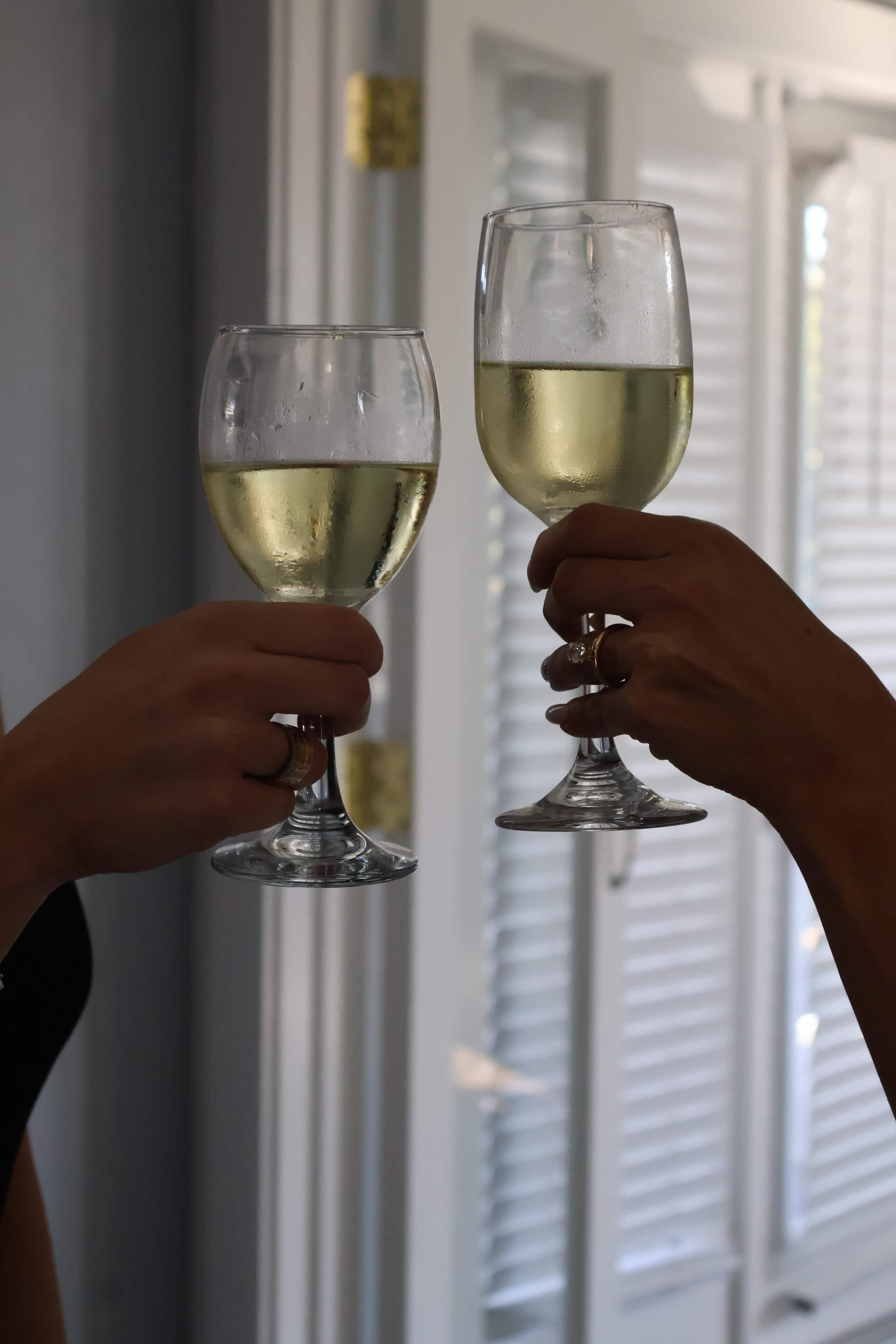 Champagne toast during wedding preparation at Saint Patrick Palace in South Florida