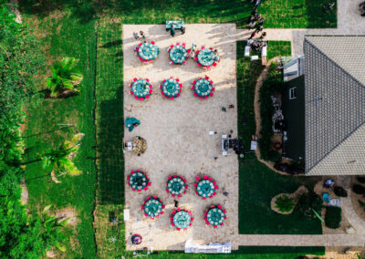 Aerial view of colorful outdoor wedding setup at Saint Patrick Palace