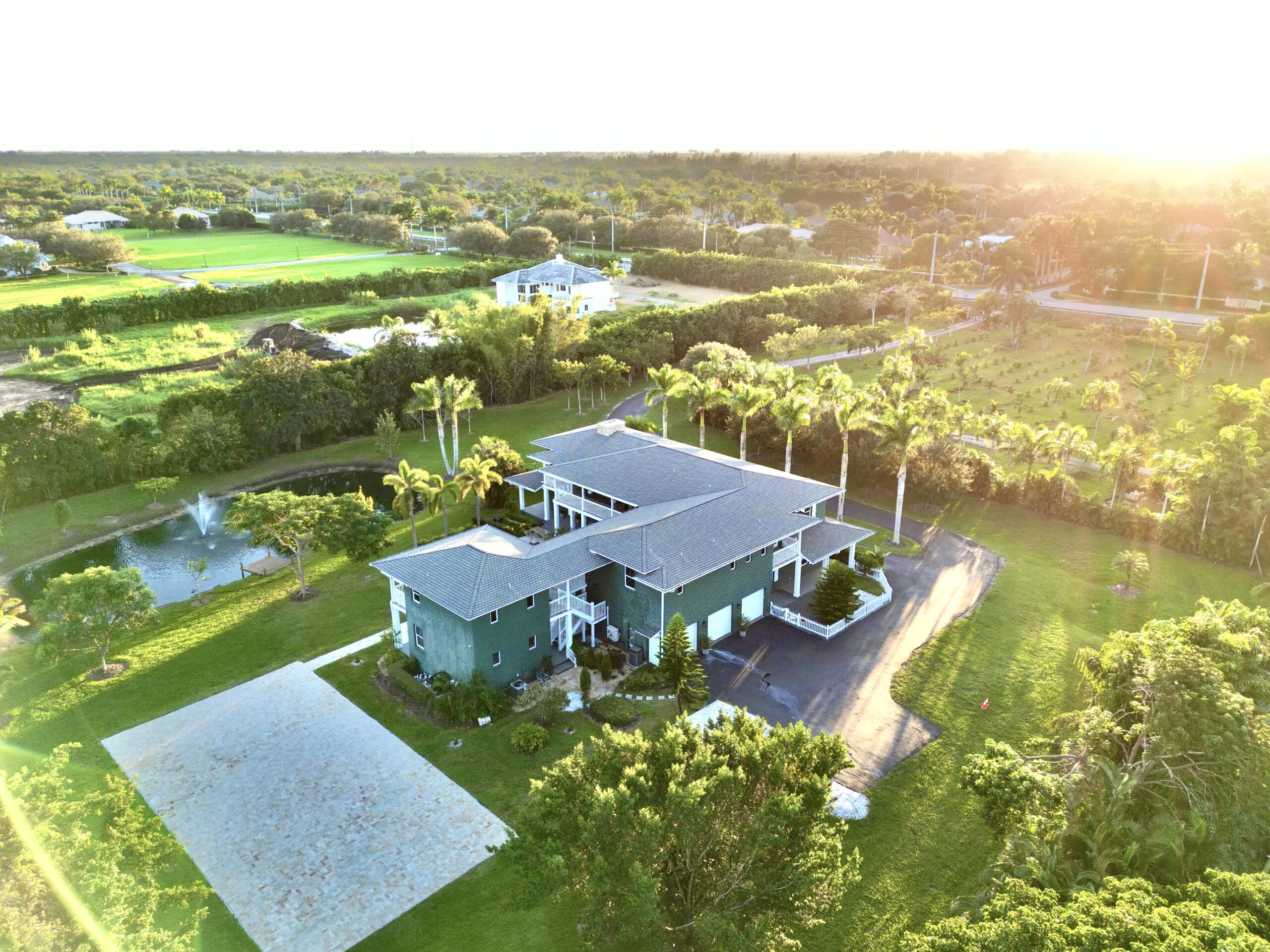 Film-friendly luxury estate in Davie, FL with pond, pool, and open grounds. Perfect for shoots, events, and productions.