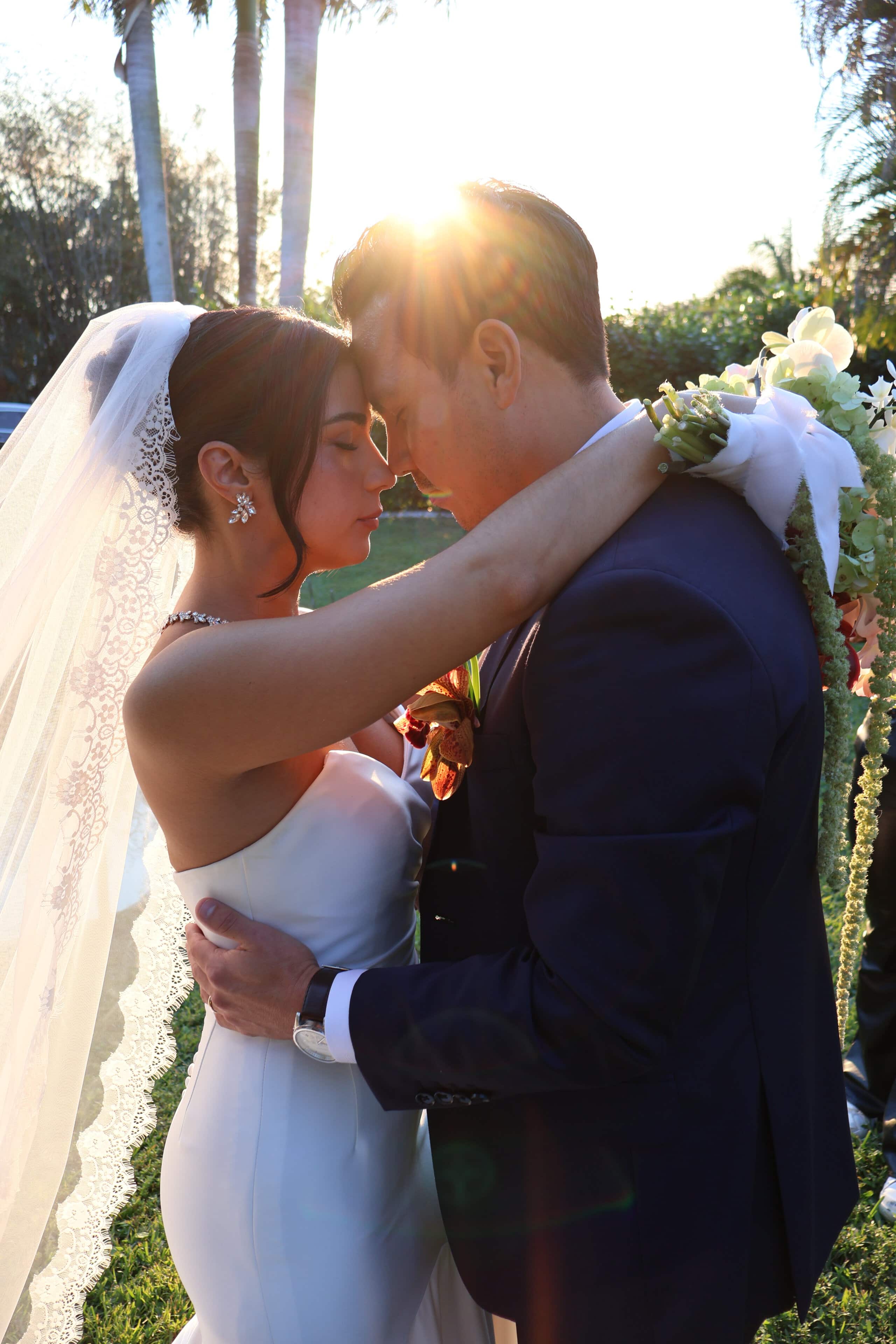 Bride and groom sharing golden hour moment at Saint Patrick Palace wedding venue in South Florida