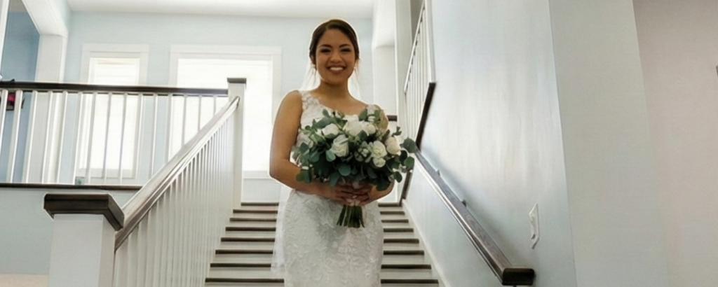 Bride posing on the indoor grand staircase at Saint Patrick Palace, a private luxury wedding venue in the Fort Lauderdale area.