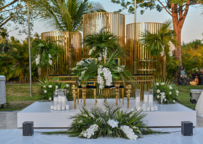 Gold sweetheart table with orchids and tropical greenery at Saint Patrick Palace