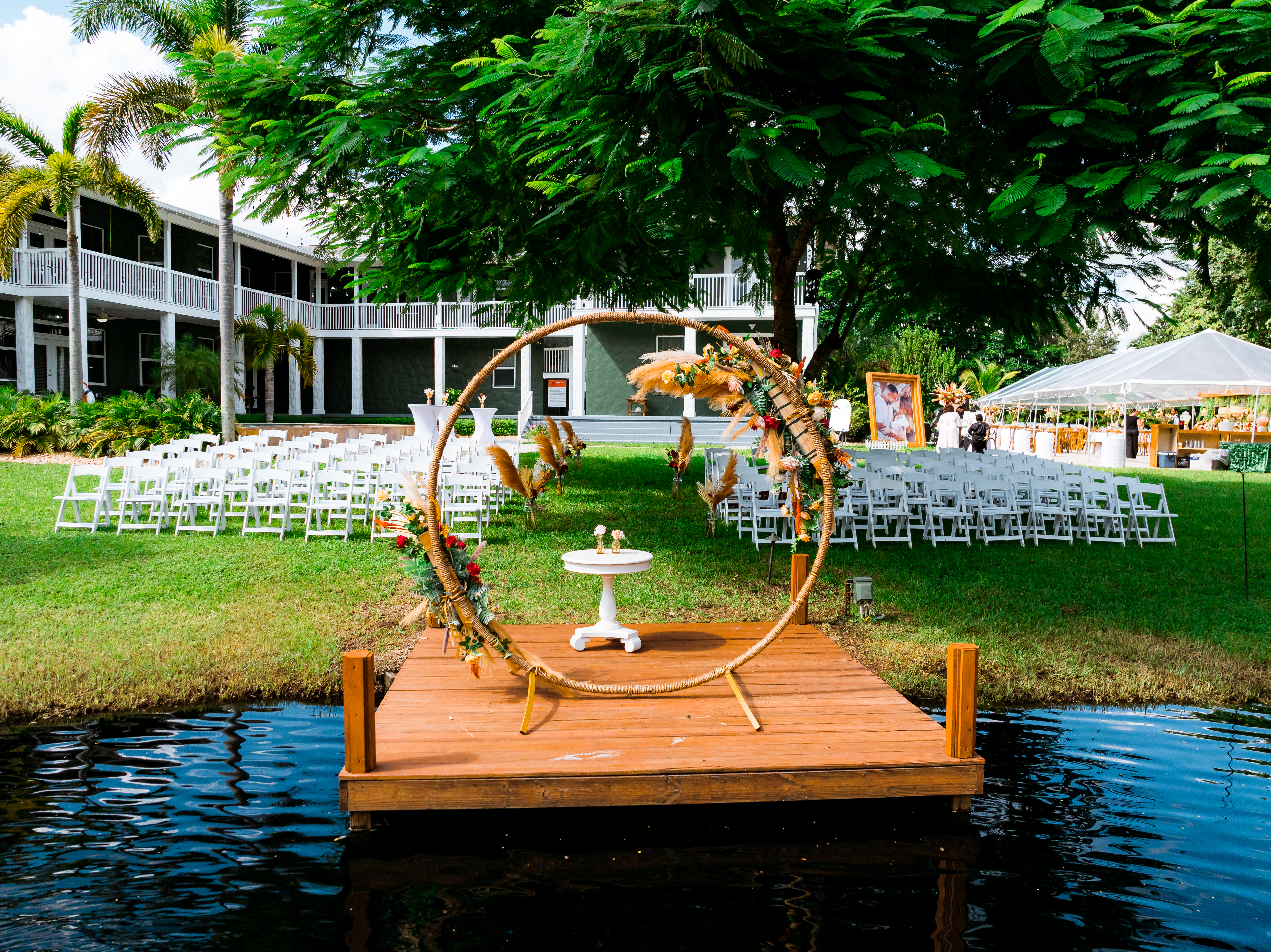 Aerial view of lakeside ceremony setup at Saint Patrick Palace wedding venue