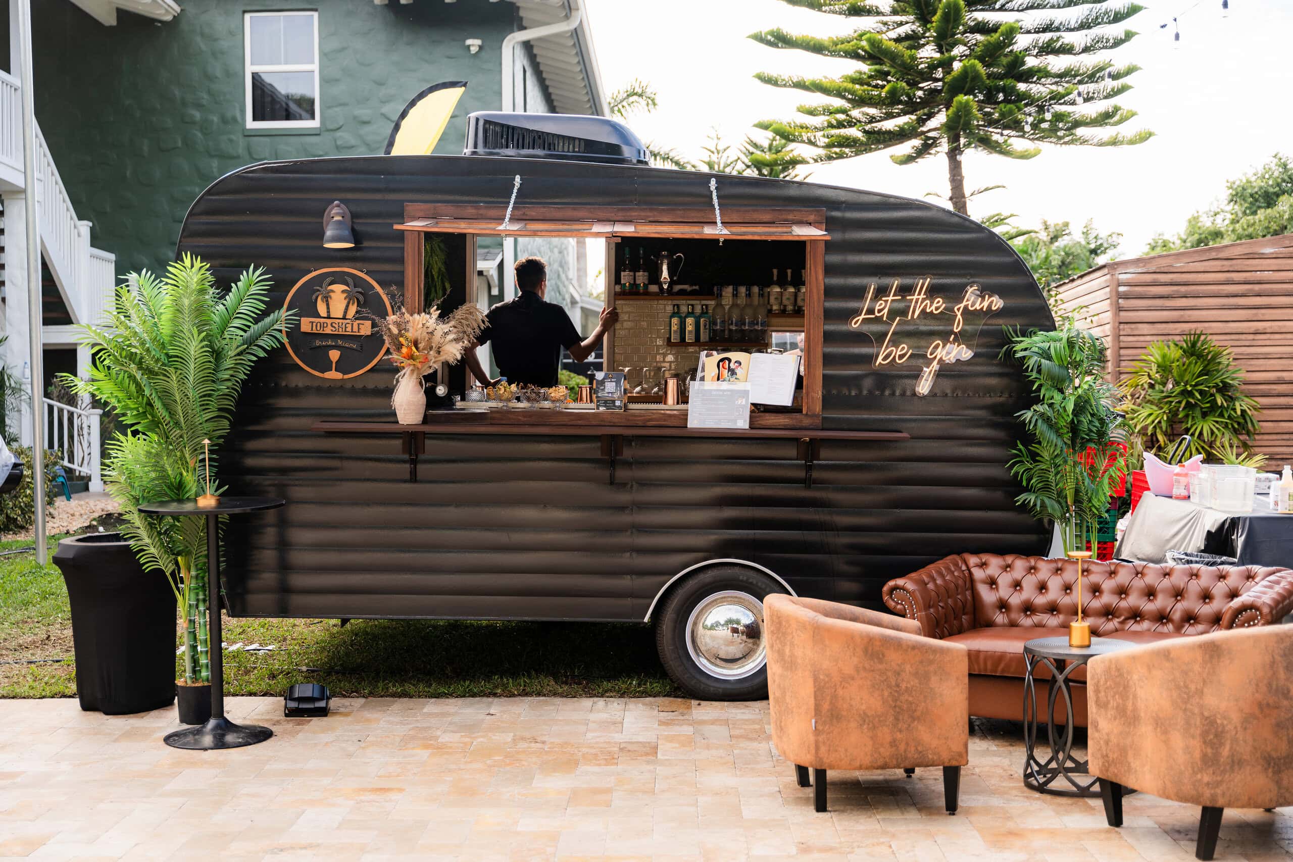 Mobile bar trailer at outdoor wedding showing open vendor cocktail flexibility at Saint Patrick Palace reception