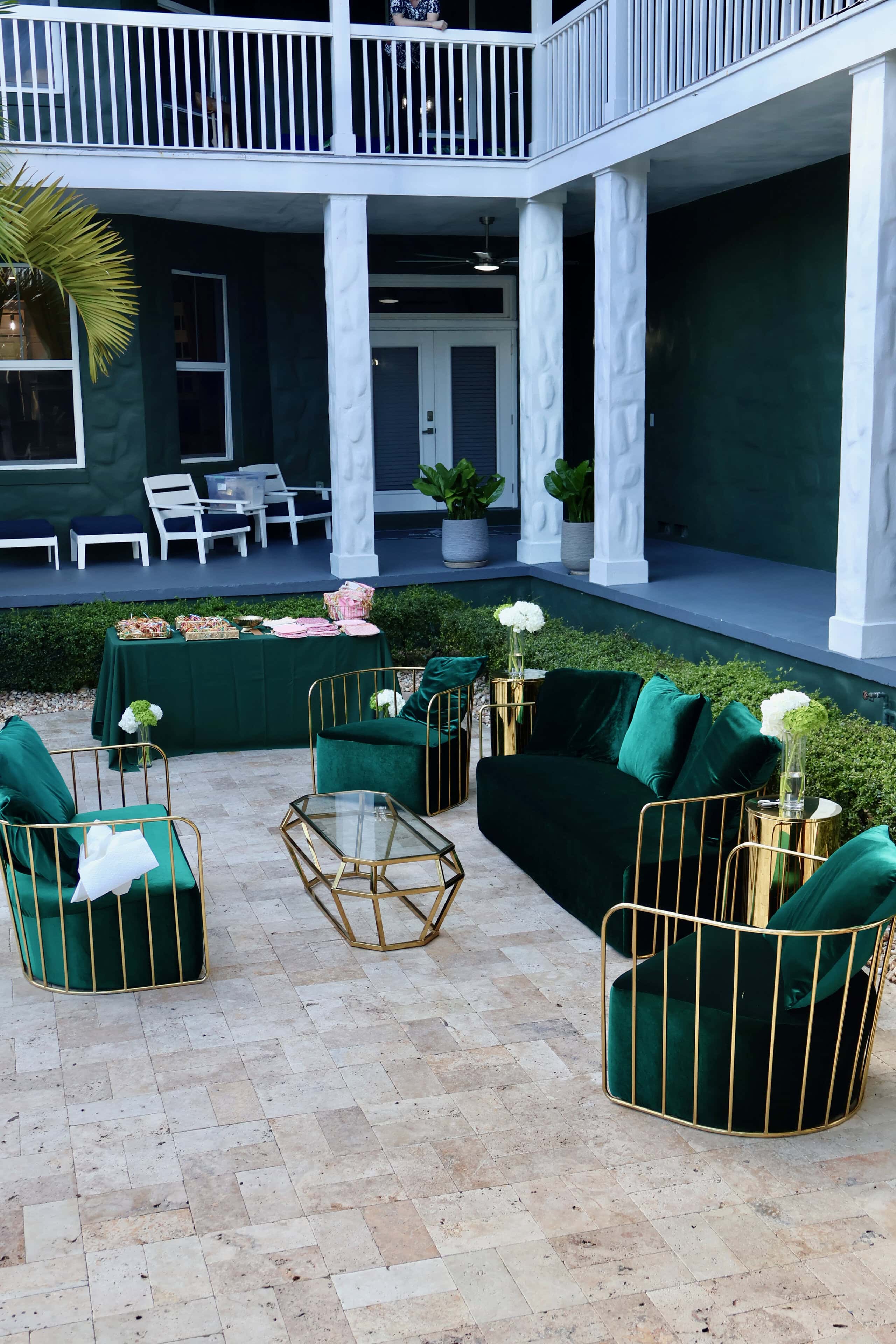 Luxury outdoor cocktail lounge beside a resort-style pool for a milestone birthday celebration in South Florida.
