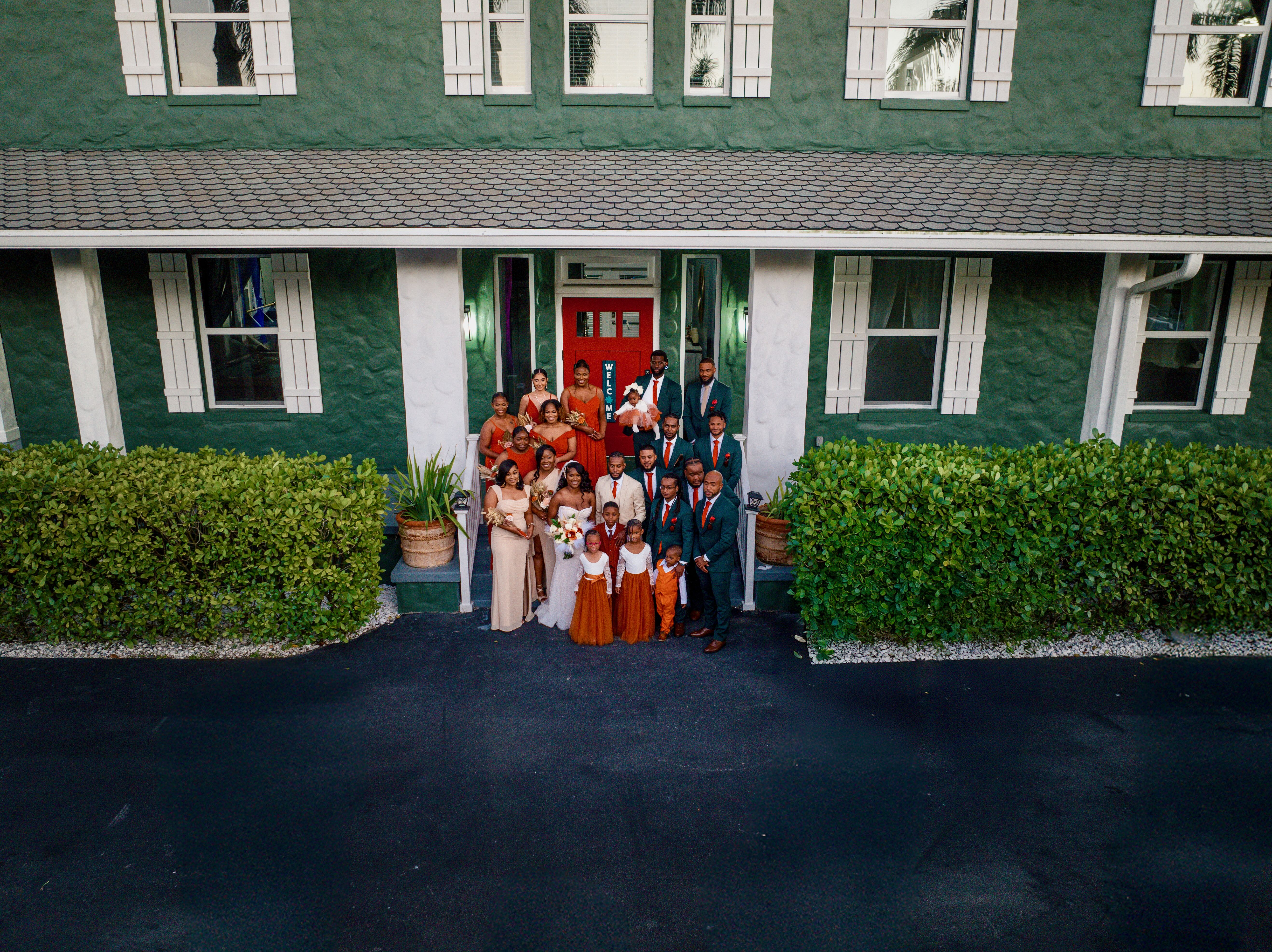 Wedding party and family portrait at Saint Patrick Palace during an elevated wedding weekend celebration in South Florida.