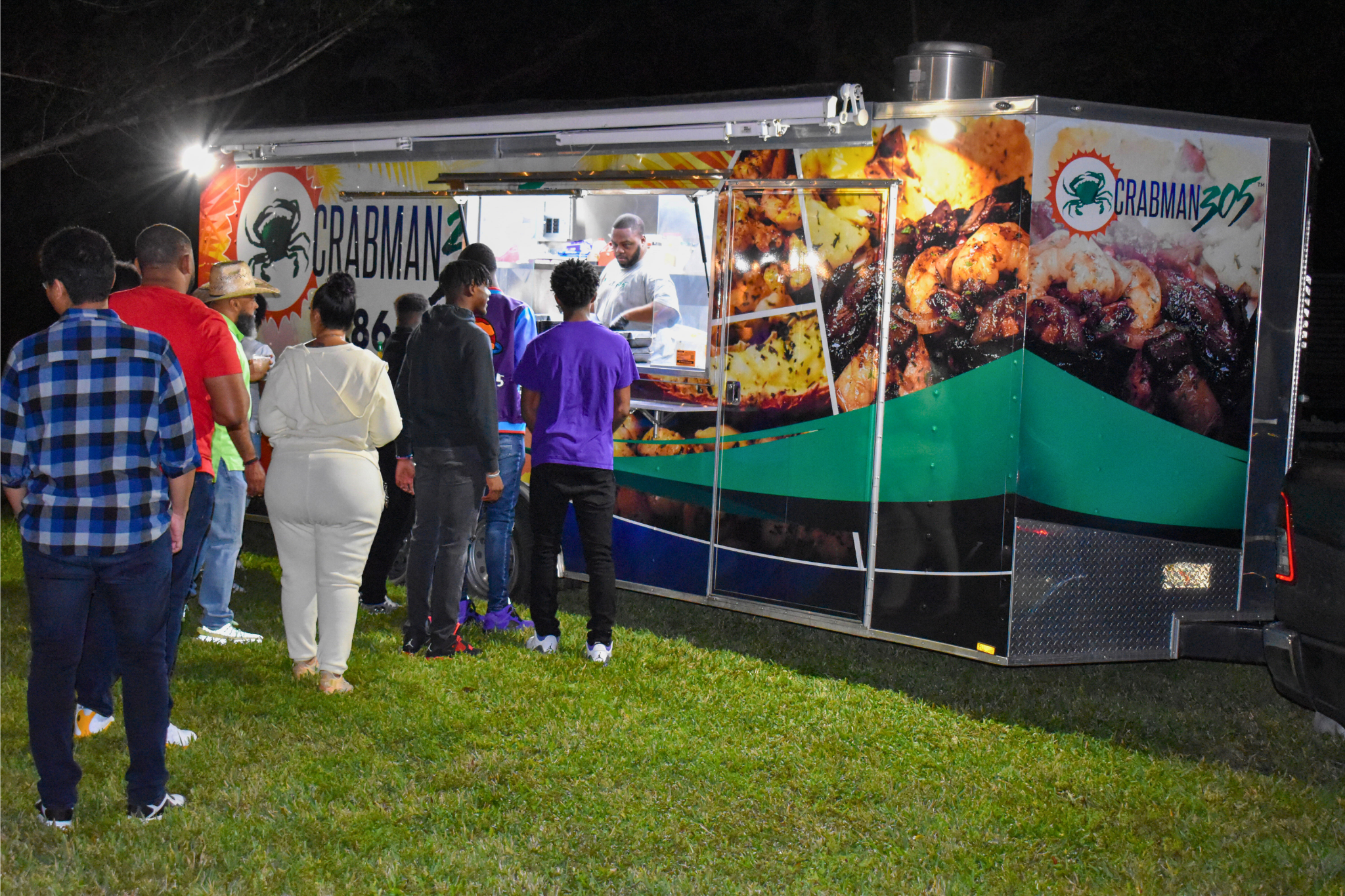 Guests enjoy late-night bites from a food truck at a private estate Sweet 16 celebration.