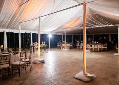 Tented wedding reception at Saint Patrick Palace in South Florida, promoting a wedding glossary blog for couples.
