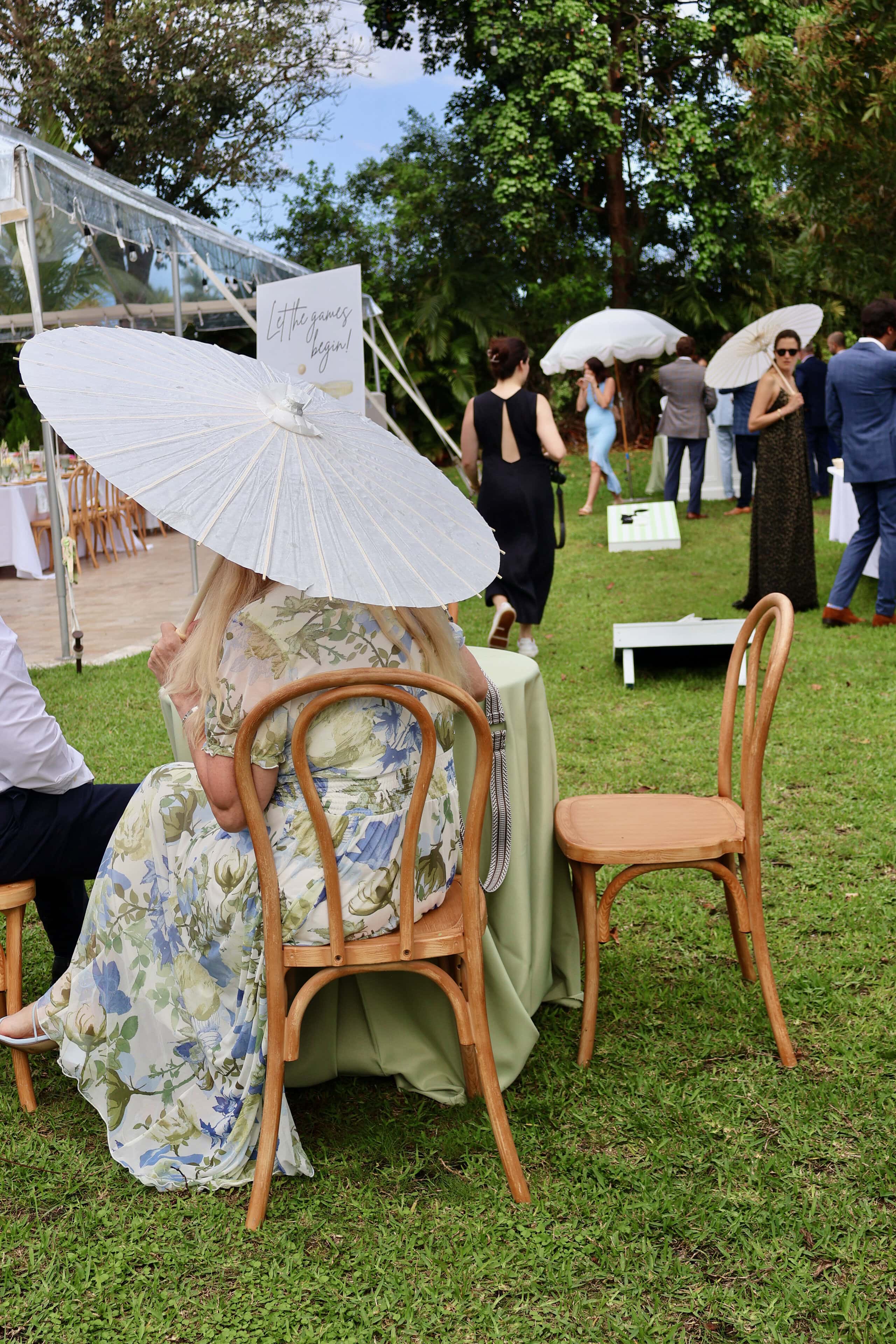 Wedding guests enjoying lawn games and cocktail hour at Saint Patrick Palace in Davie, South Florida.