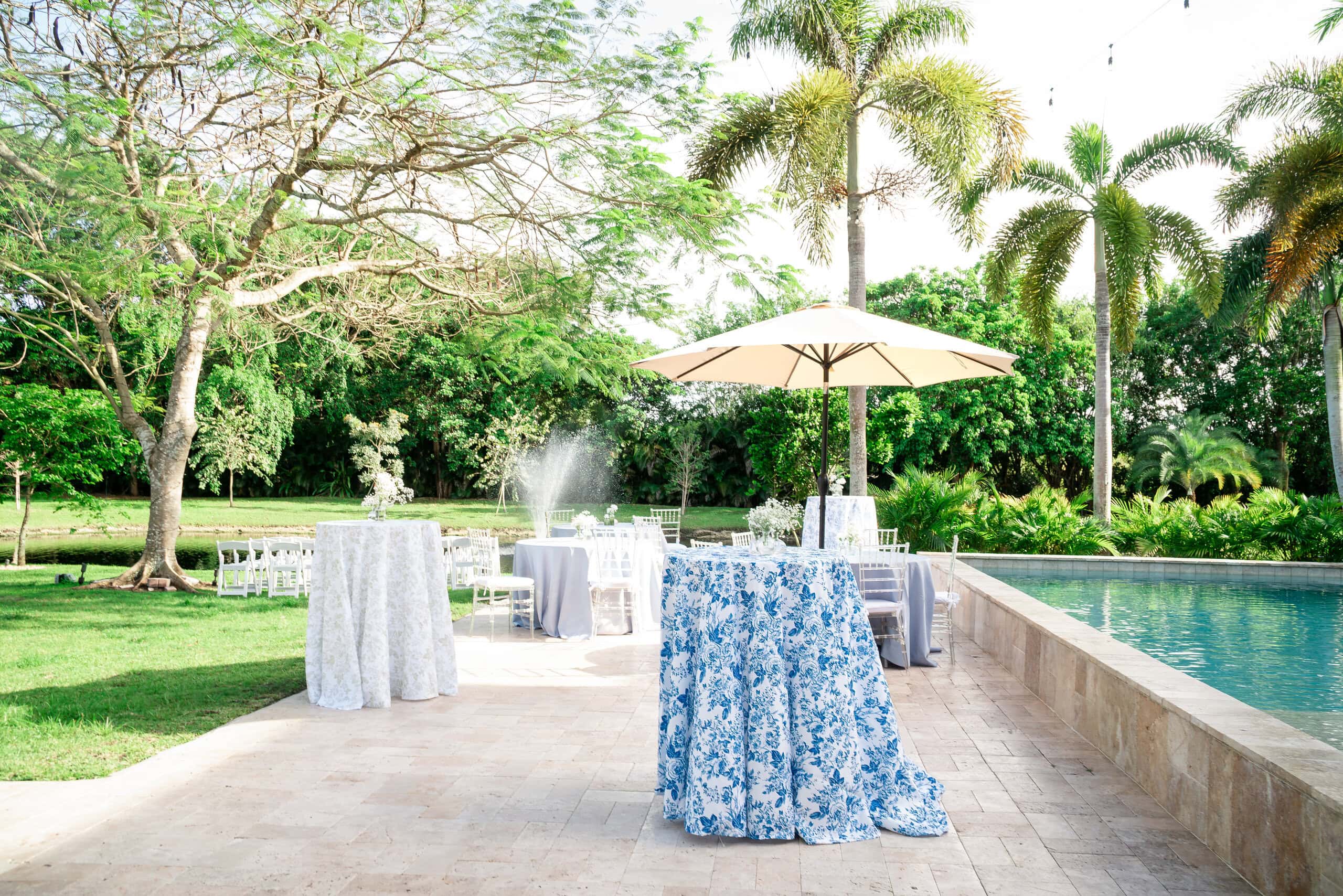 Poolside cocktail hour setup at Saint Patrick Palace wedding venue in South Florida.