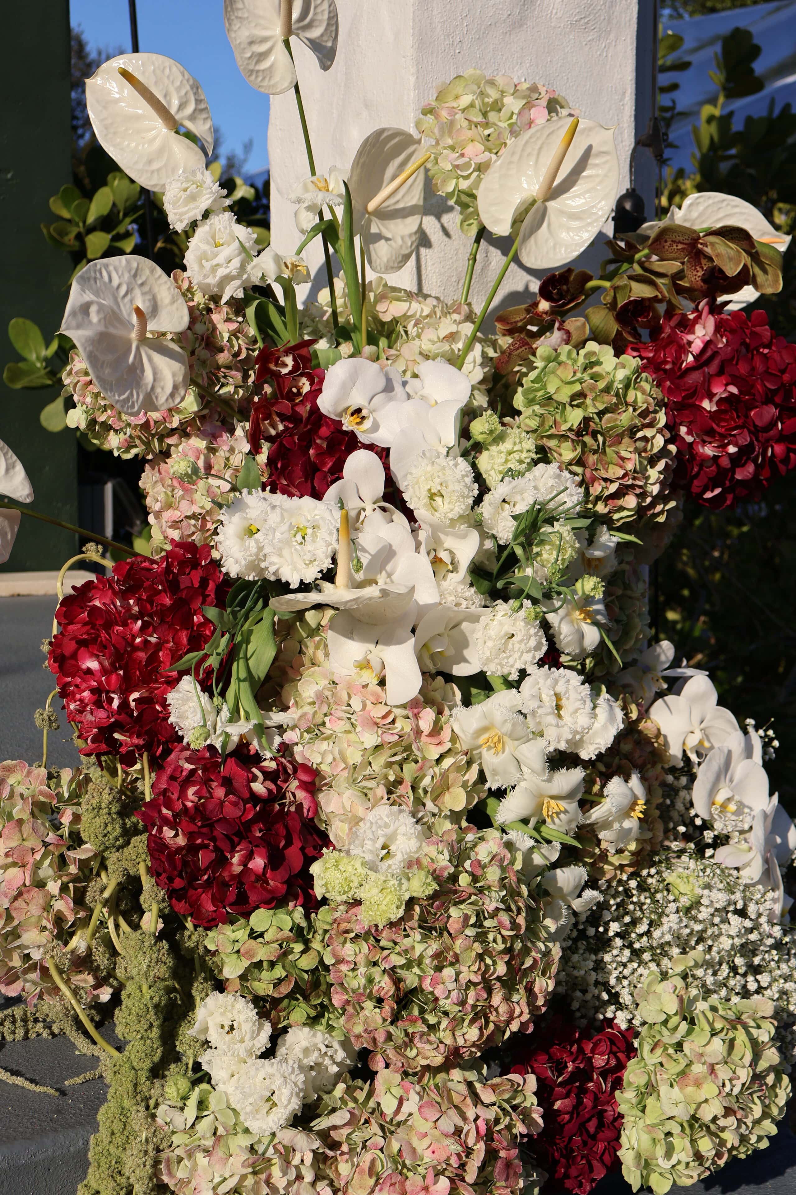 Wedding floral arrangement with orchids and hydrangeas at Saint Patrick Palace